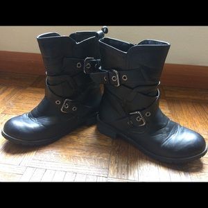 Black boots with buckle details